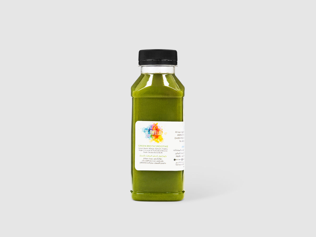 Green smoothie bottle with black cap and white label