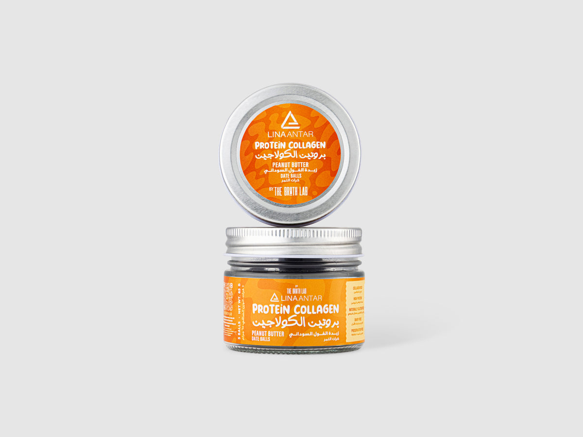 Orange-labeled protein collagen peanut butter balls in clear jar with lid