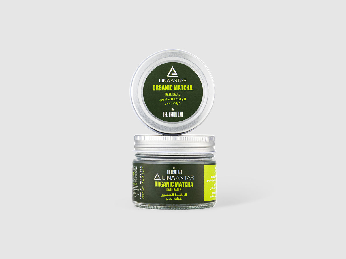 Organic matcha energy balls jar with green label and dark green contents