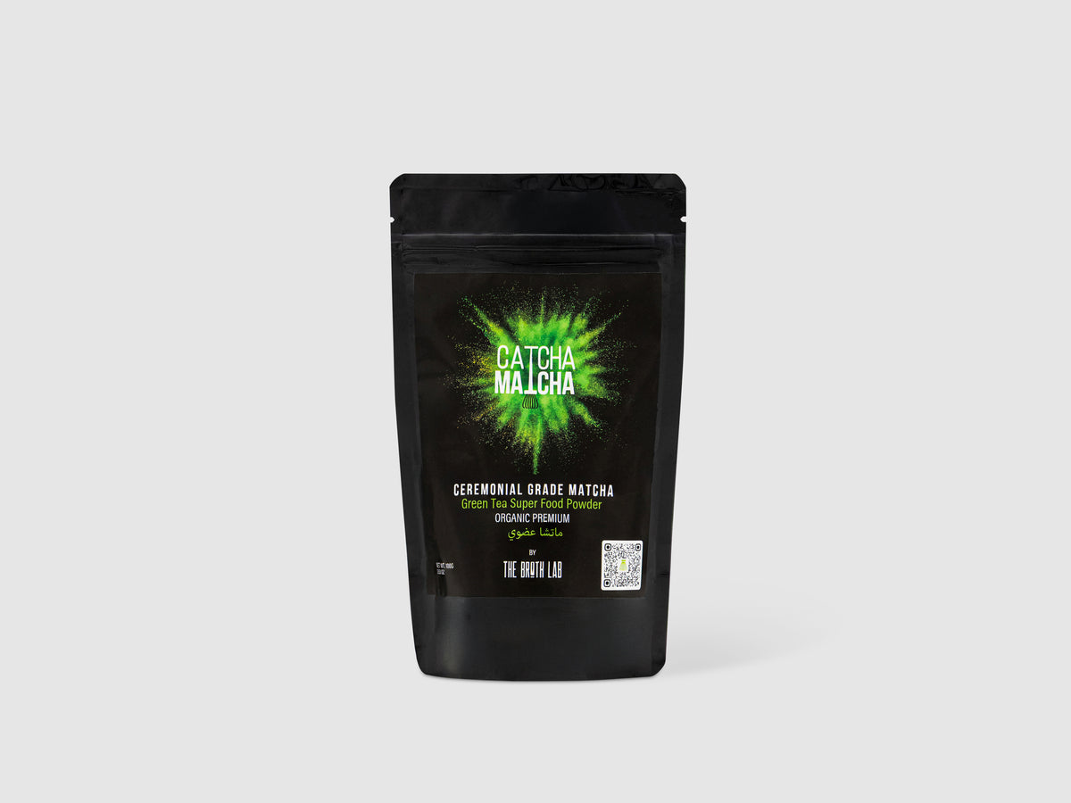 Ceremonial matcha powder bag, black pouch with green burst logo and label