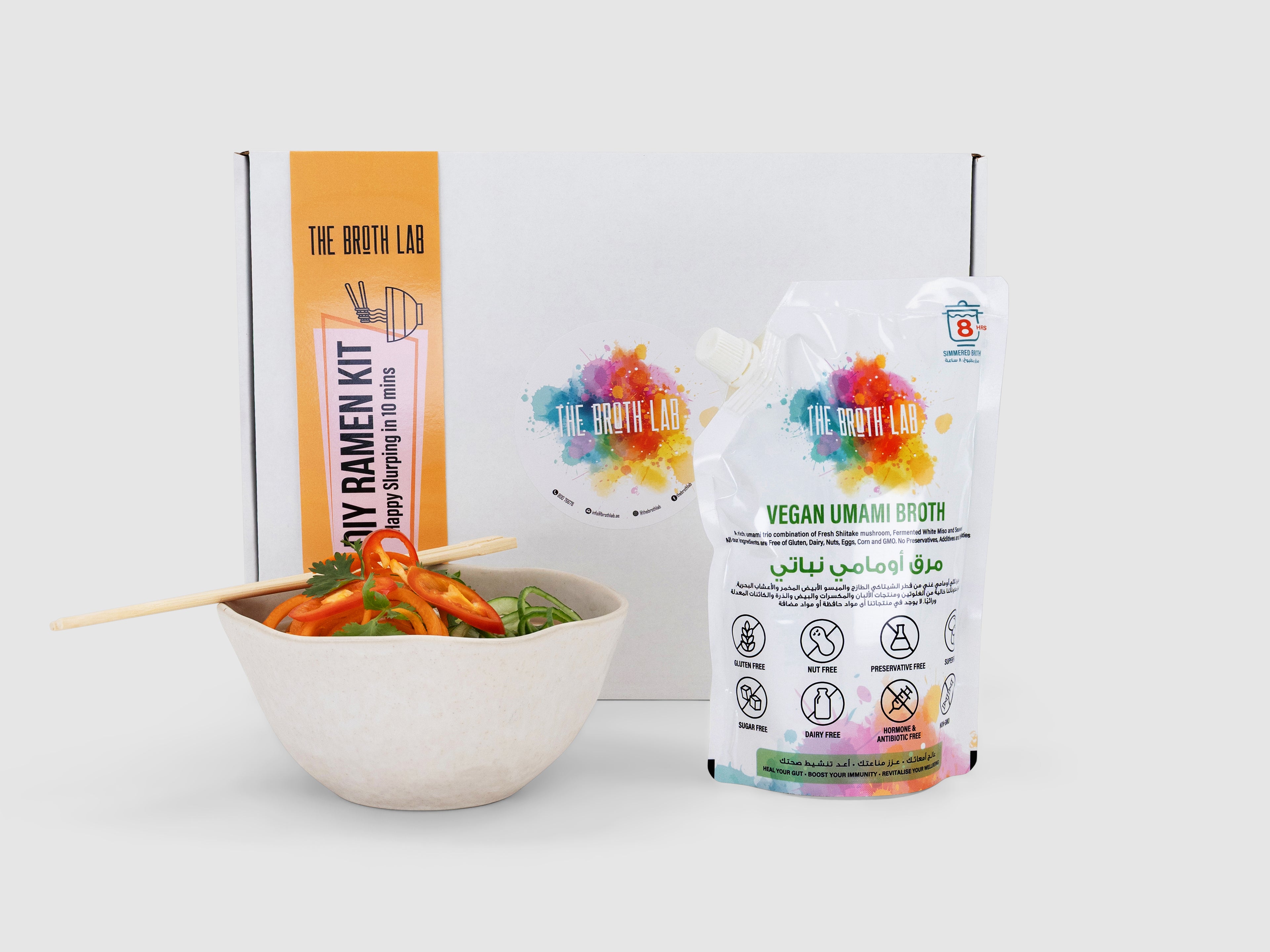 Ramen noodles kit box with bowl and vegan broth pouch, plus chopsticks
