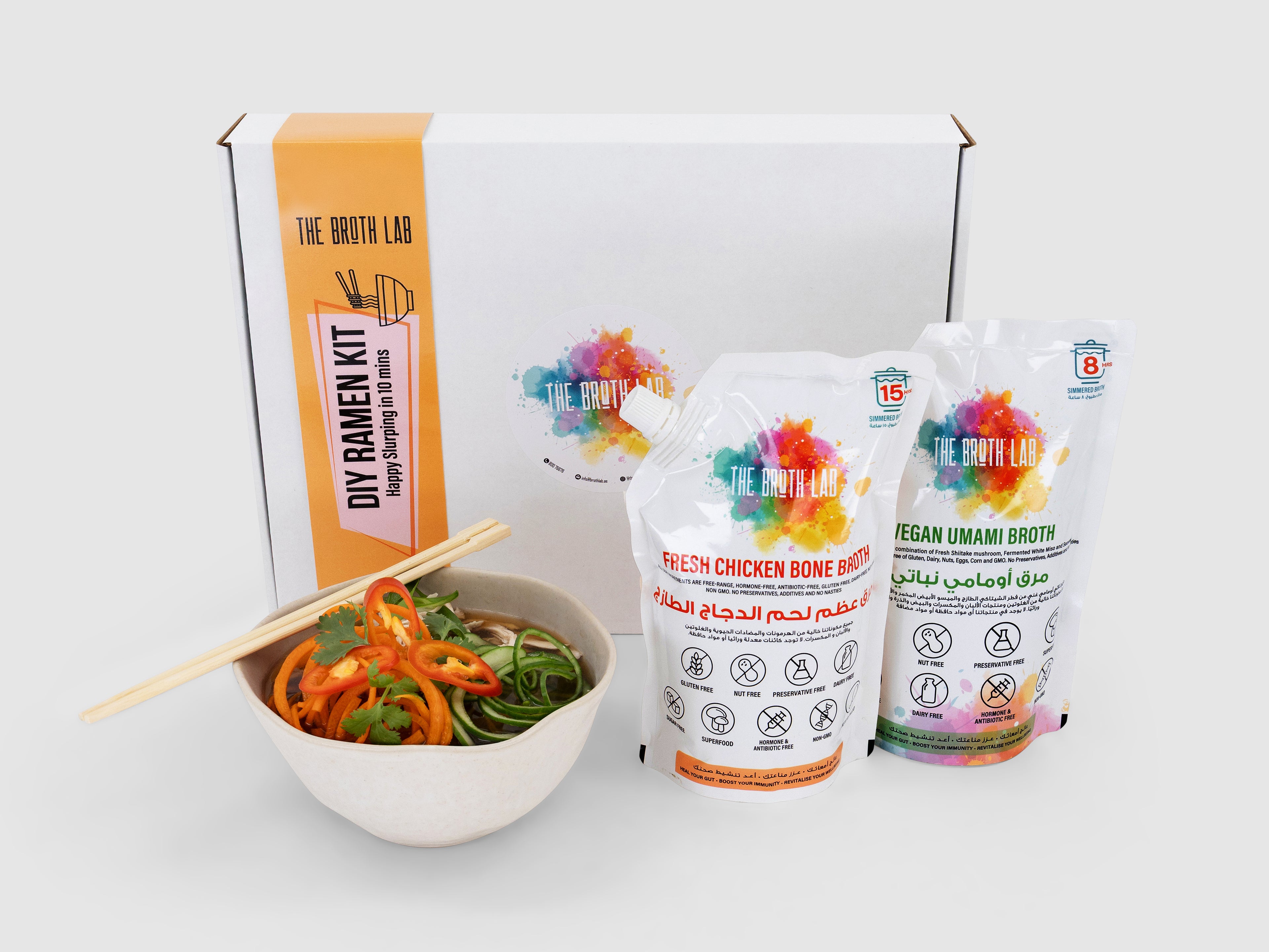 The Broth Lab DIY Ramen Kit with ramen bowl, noodles, and broth packets on a white background