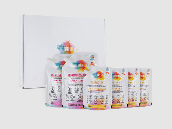 Baby food pouch variety pack in open box with multiple colorful standing packets